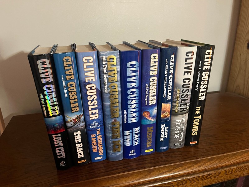 Clive Cussler books. Lot of 9 BRAND NEW Hardcovers for 75% off retail price!