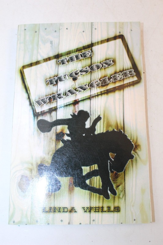 The Tucson Wrangler by Wells signed copy 2013
