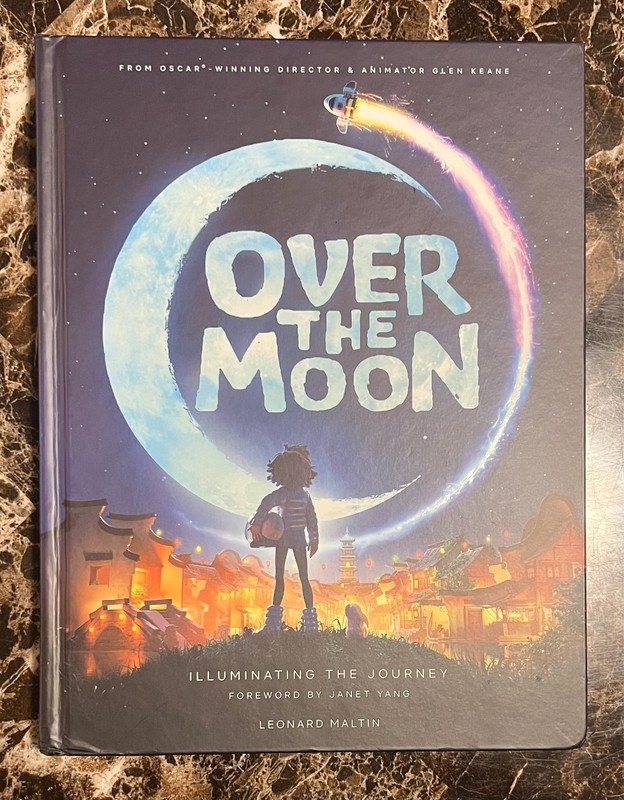 Over the Moon: Illuminating the Journey by Leonard Maltin (2020, Hardcover) – LN
