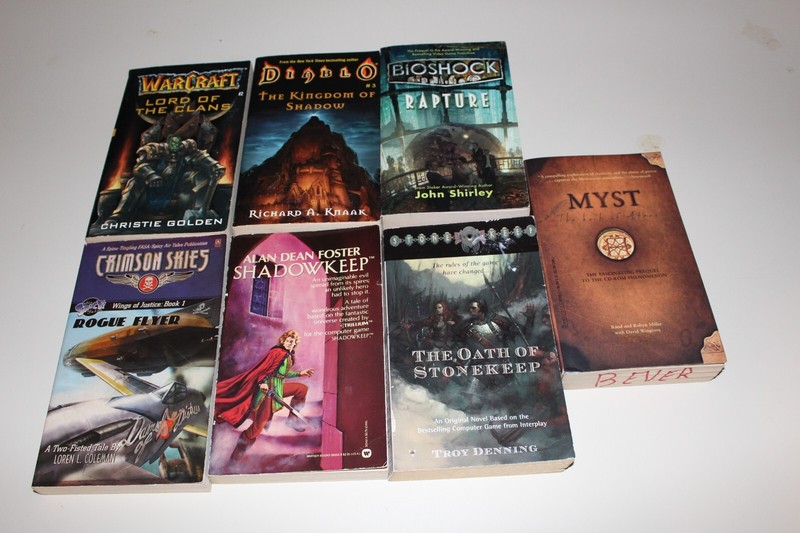 Lot of 7 video game tie-in paperbacks, 1980s/1990s, Baldur’s Gate, Bioshock